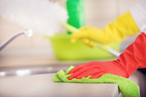 Supervisor reviewing safe working practices during carpet cleaning